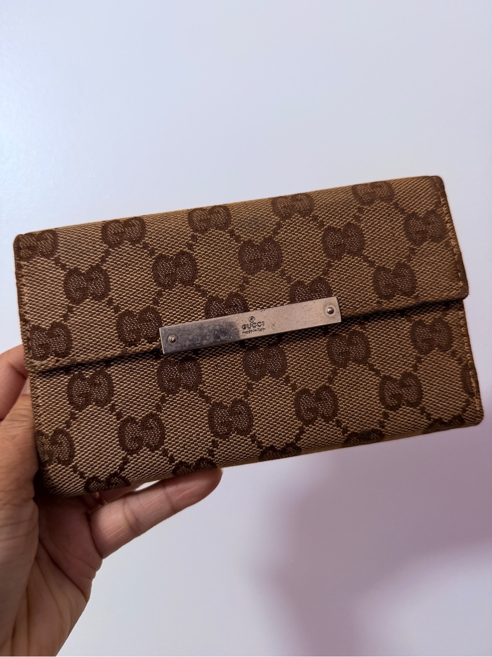Gucci Brown GG Supreme Flap Wallet with Metal Plaque